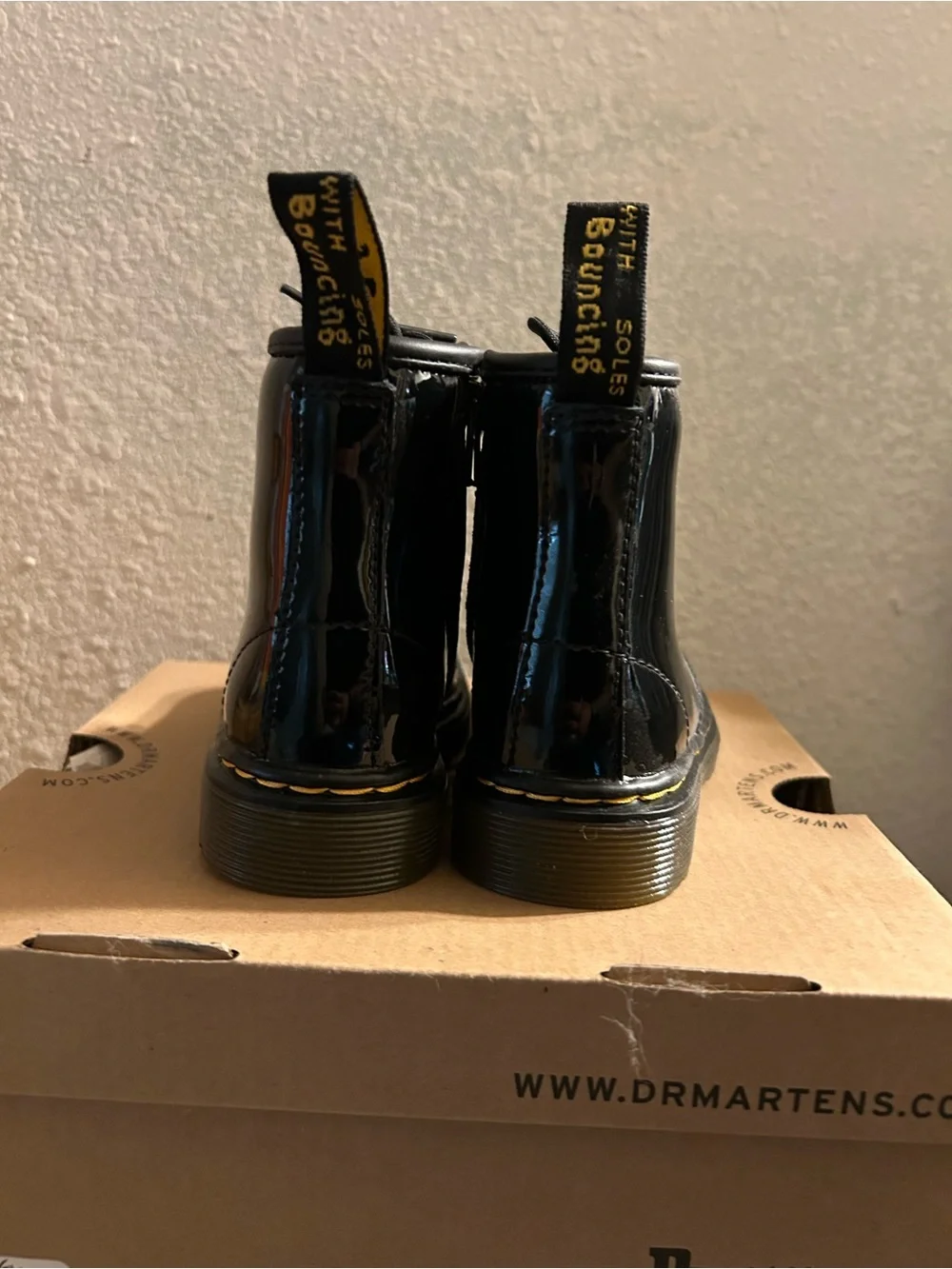 Dr. Martens Black Patent Lace-Up Ankle Boots with Yellow Stitching